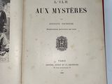 an open book with a picture of a man and a dog