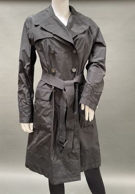 an image of a mannequin dressed in a trench coat