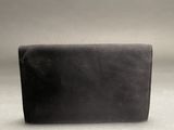 black leather wallet on a gray background with a white background