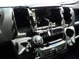 a picture of a car dashboard with a steering control