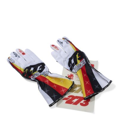 a pair of racing gloves with a flag on them