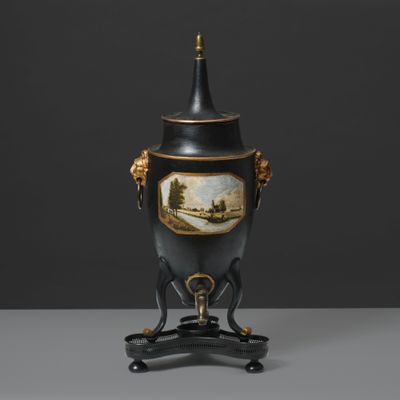 a black vase with a painting on it sitting on a stand