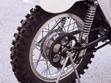 a motorcycle that is parked on the side of the road