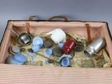 an open suitcase with a lot of items inside of it