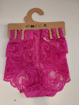 pink lace shorts with a wooden hanger on a white background