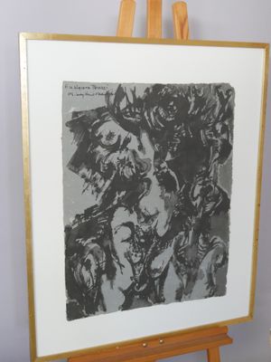 a black and white picture of a painting on a easel