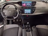 the interior of a car with a steering wheel, dashboard, and dashboard controls