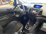 the interior of a car with a steering wheel, dashboard, and dashboard controls