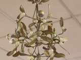 a chandelier hanging from the ceiling in a store