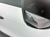 a close up of a car ' s rear view mirror