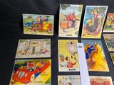 several children ' s books are lined up on a black table