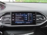 an image of a car dashboard with a touch screen