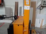 a picture of a fork lifter in a garage
