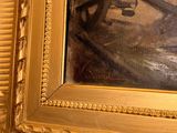 a picture of a painting of a plane in a gold frame