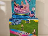 two boxes of inflatable toys that are on display