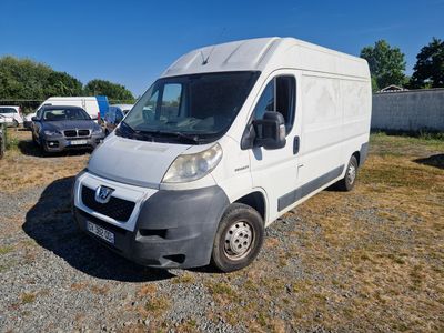 a white van that is parked in a lot