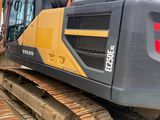 an image of a construction vehicle that is parked on the side of the road