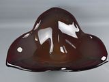 une sauce au chocolat en forme de cœur sur une cuillère