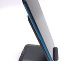 a cell phone that is sitting on a stand
