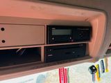 a picture of a car dashboard with a radio in it