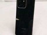 an image of a close up of a cell phone on a table