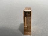 an image of a lighter that is sitting on top of a table