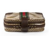 a guccissi bag with a green and red stripe on the side