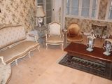 a living room with a lot of furniture in it
