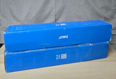 two boxes that are sitting on a table
