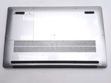 a close up of a silver laptop on a white surface