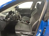 the interior of a blue car with black leather seats and a steering wheel