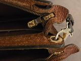 a close up of a purse with a zipper open