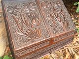 a wooden box that is sitting on the ground