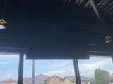 a view out of a window of a house with a lot of windows