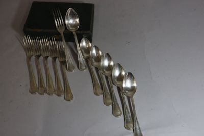 a bunch of silver spoons and spoon spoons on a table