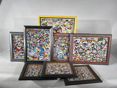 four framed art pieces of different colors and designs on a white surface