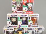 a lot of different pop vinyl figures in the box