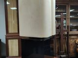 an image of a display case with a chair in it