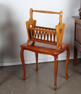 a wooden chair sitting next to a dresser in a room