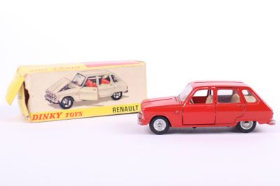 an image of a red toy car next to a boxed box