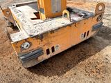 a yellow bulldozer that is sitting in the dirt