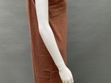 an image of a mannequin wearing a brown dress on a mannequin head