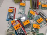 many different types of screws and screws on the table