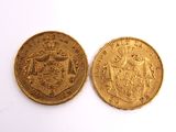 two gold sovereigns, one of which is a sovereign and the other of which is a sovereign