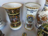 many vases that are sitting on a table