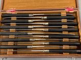 six different types of knives in a wooden case