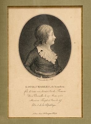 portrait of a young man in a black dress with a white collar