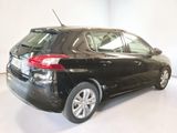 a picture of a black car parked in a white room