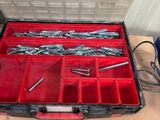 a tool box with tools in it on a table