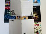 many books that are on the table together